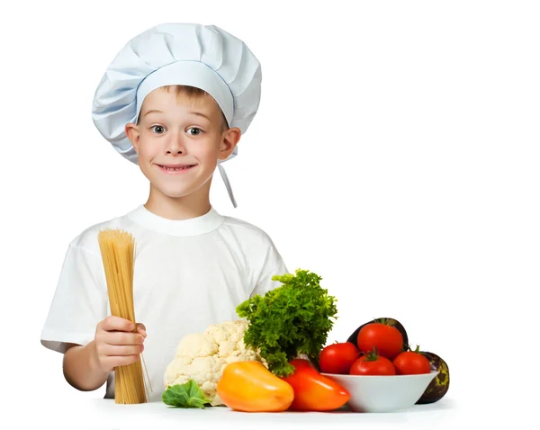 Cute boy Chef is holding raw spaghetti. isolated — Stock Photo, Image