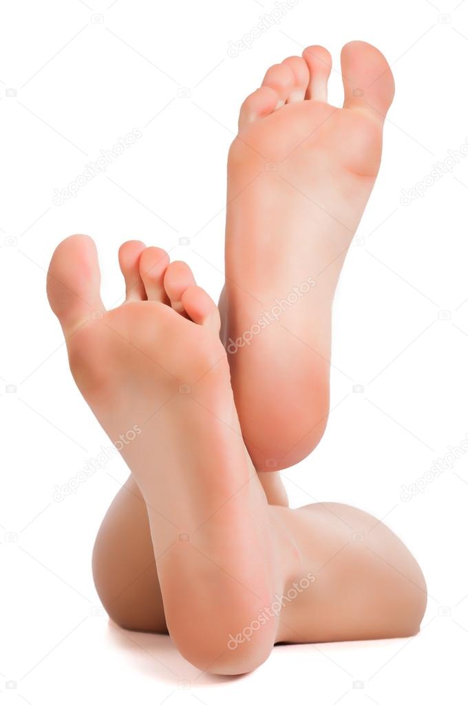 Female feet isolated on white
