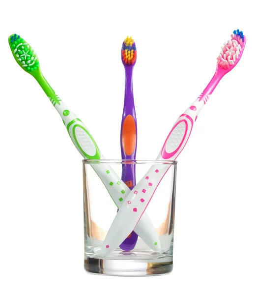 Conjunto de escovas de dentes multicoloridas isoladas em branco — Fotografia de Stock