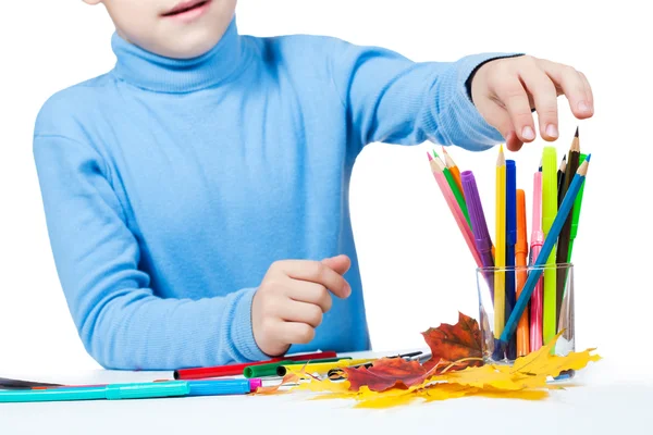 Boy is drawing with pencils — Stock Photo, Image