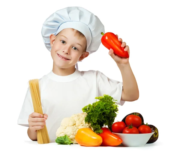 Scullion is holding raw spaghetti and bell pepper — Stock Photo, Image