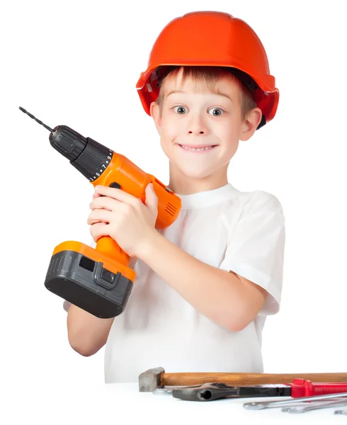 Веселый маленький мальчик с электрической отверткой — стоковое фото