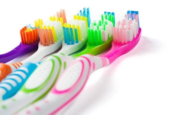 Set of multicolored toothbrushes isolated on white — Stock Photo, Image