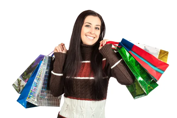 Winkelen. mooi blij meisje met shopping tassen. — Stockfoto