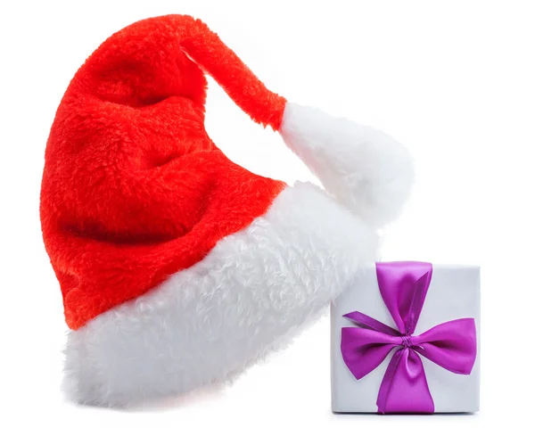 Santa claus red hat gift box with bow — Stock Photo, Image