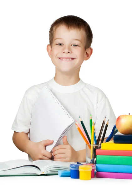 Estudante bonito menino com livros e lápis — Fotografia de Stock