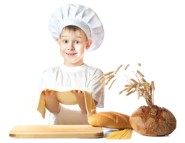 Cute scullion is kneading dough. isolated — Stock Photo, Image