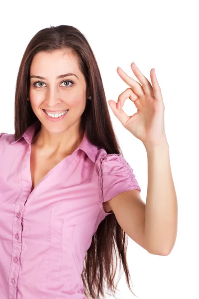 Cute brunette is showing hand sign ok — Stock Photo, Image