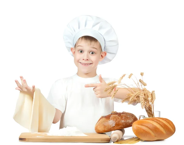 Funny little master chef is kneading dough — Stock Photo, Image
