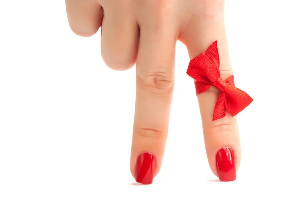 Dos dedos femeninos con manicura roja como piernas —  Fotos de Stock