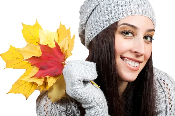 Cheerful woman with yellow autumn leafs. isolated — Stock Photo, Image