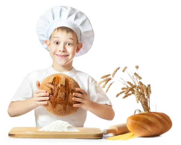 Funny little scullion is kneading dough — Stock Photo, Image