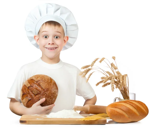 Funny little scullion is kneading dough — Stock Photo, Image