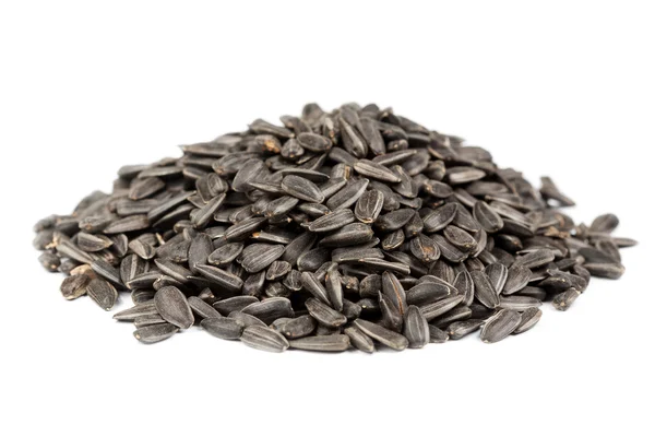 Handful of sunflower seeds isolated on a white — Stock Photo, Image