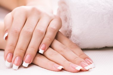 Female hands with towel. Spa