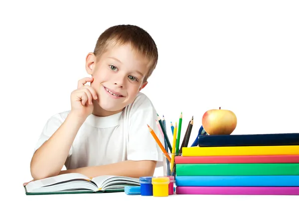 Funny kid with books and pencils — Stock Photo, Image