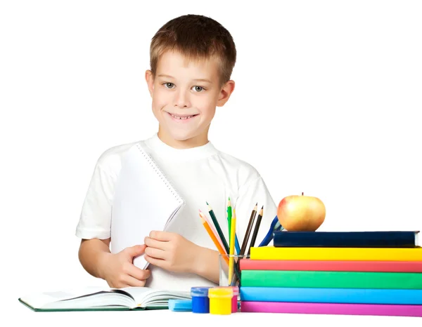 Cute schoolboy with books and pencils — Stock Photo, Image