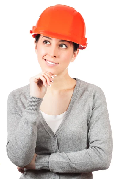 Jeune femme avec chapeau dur orange — Photo