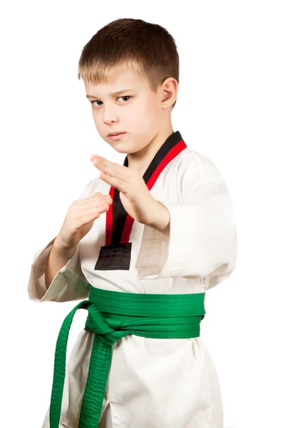 Joven niño entrenamiento karate . — Foto de Stock