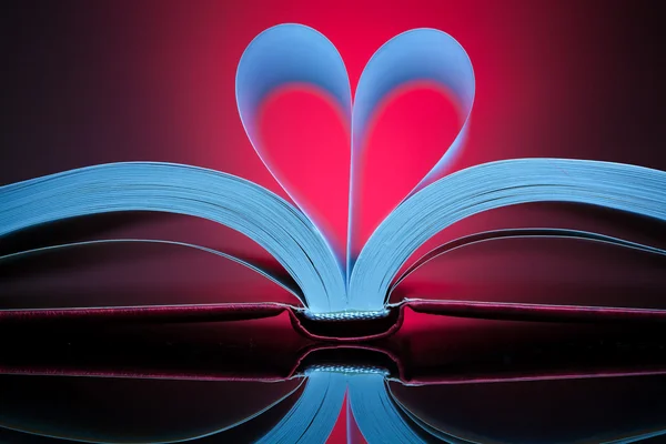 Sign of heart with book pages — Stock Photo, Image