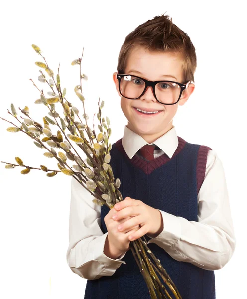 Nice boy in a hurry for a date with a bunch of willow — Stock Photo, Image