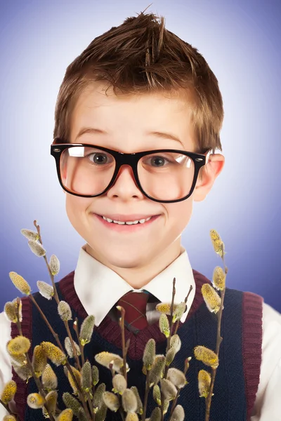 Boy in a hurry for a date with a bunch of willow — Stock Photo, Image