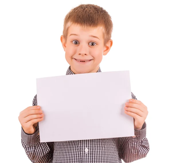 Legrační roztomilý chlapec s bílým listem papíru — Stock fotografie