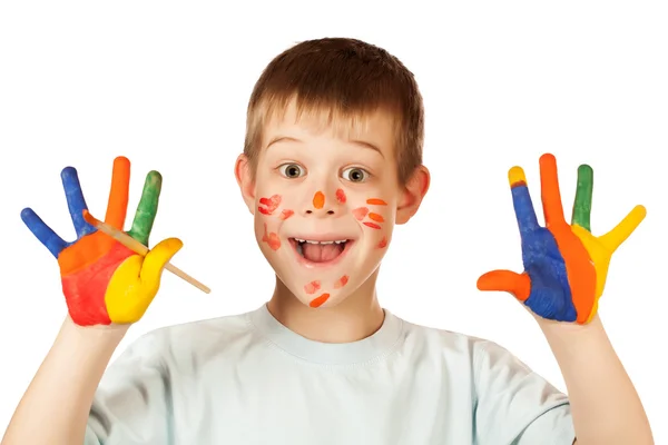 Leende glad pojke med färgade färgade hand — Stockfoto