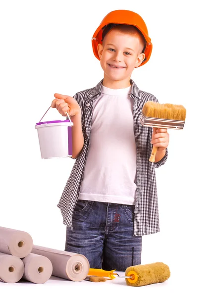 Niño con un rollo de papel pintado y cepillo. aislado — Foto de Stock