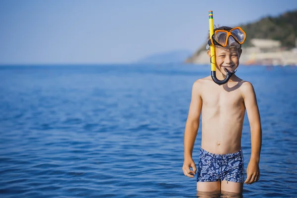 Cute boy driver on the beach — Stock Photo, Image