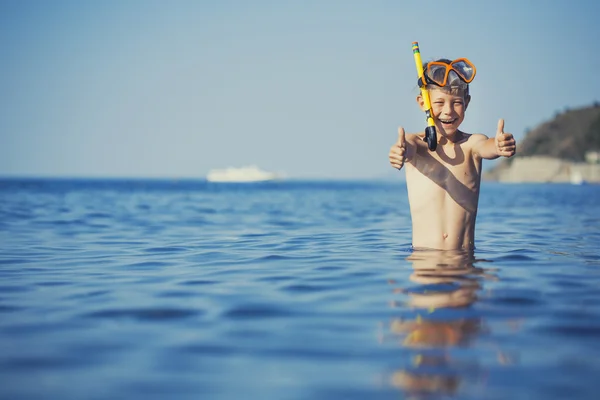 Cute boy driver on the beach — Stock Photo, Image