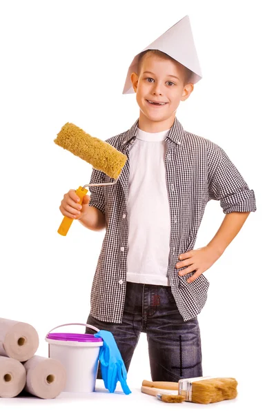Little boy with wallpaper and paint roller — Stock Photo, Image