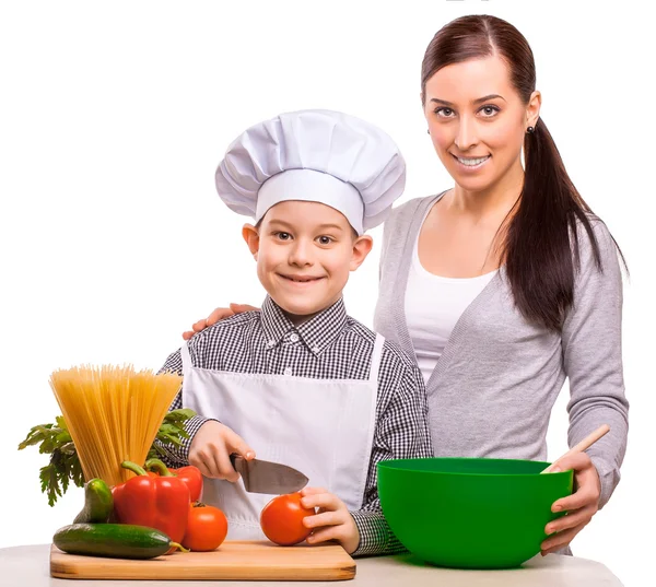 Happy mom and som are cooking in the kitchen — Stock Photo, Image