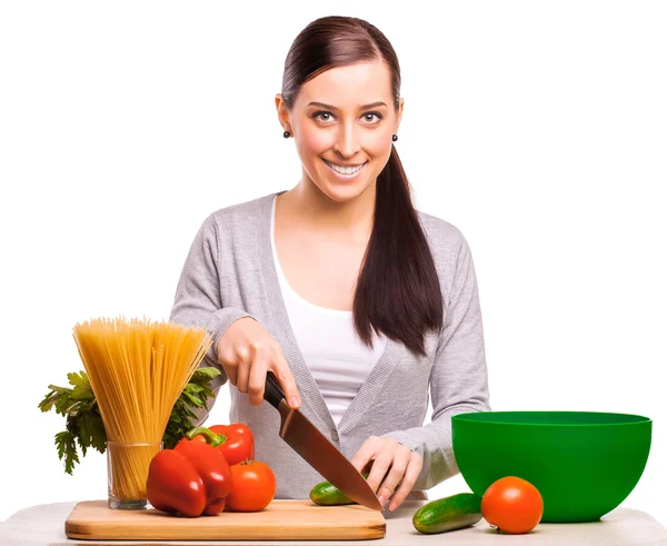 Glad mor og som laver mad på køkkenet - Stock-foto