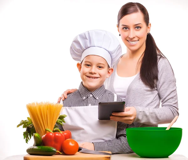 Happy mom and som are cooking on the kitchen — Stock Photo, Image