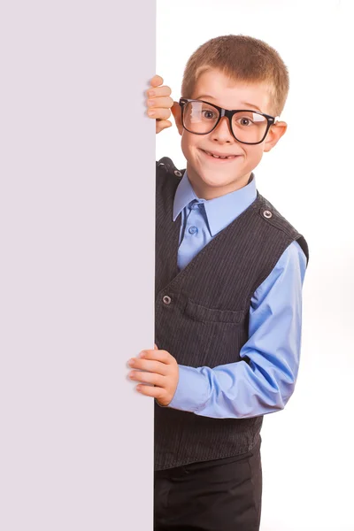 Four-eyes Boy holding a banner isolated on white — Stock Photo, Image