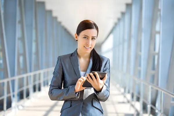 Cute businesswoman on the blue modern background — Stock Photo, Image