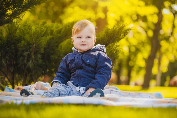 Cute baby are playing in the summer park — Stock Photo, Image