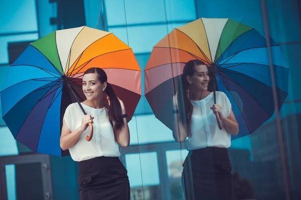 Attractive Businesswoman with rainbow umbrella — Stock Photo, Image