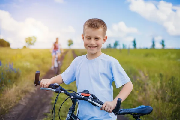 Boy with bicycle — Stock Photo, Image