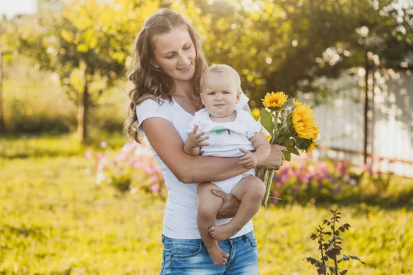 Cute One Year Old Baby Girl Mom Blooming Garden Bouquet —  Fotos de Stock