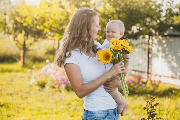 Cute One Year Old Baby Girl Mom Blooming Garden Bouquet —  Fotos de Stock