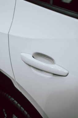 Painted handle of a white car