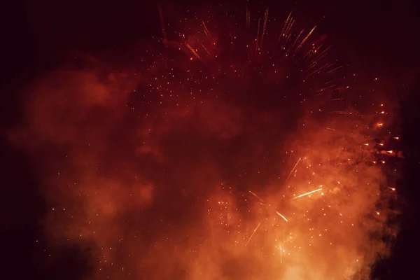 Fireworks exploding with heavy smoke like an accident