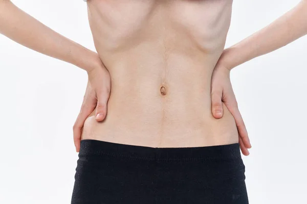 Mujer con problemas de salud de estómago plano anorexia pérdida de peso —  Fotos de Stock