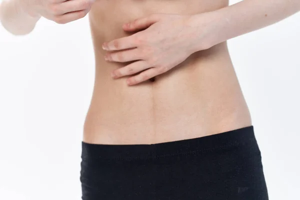 Kvinna med platt mage kost anorexi viktminskning — Stockfoto