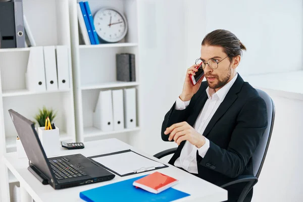 Man in a suit phone laptop work emotions lifestyle — Stock Photo, Image