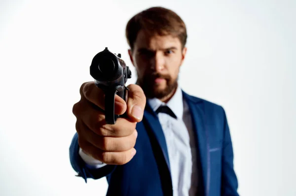Geschäftsleute Geheimagent mit Waffe in der Hand eines Verbrechens isoliert Hintergrund — Stockfoto