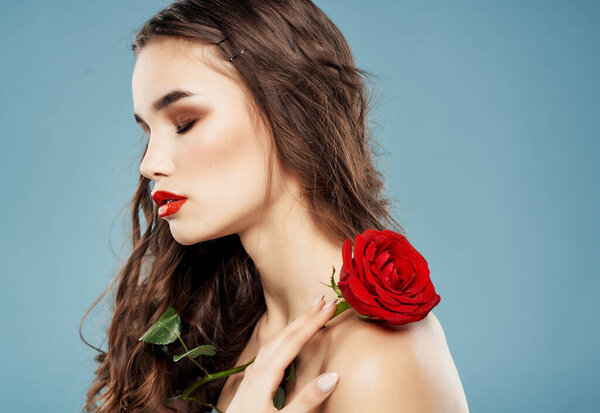 pretty woman with rose  posing. High quality photo