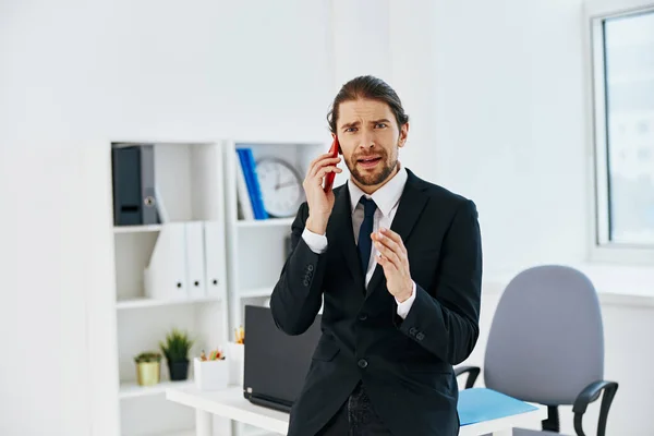 Businessman holding a phone telephone office executive — Stock Photo, Image